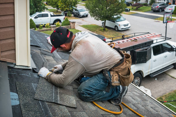 Professional Roofing technician working in Eastwood, MI